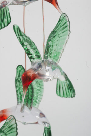 Close-up image of one of the Painted Hummingbirds that makes up the Solar Mobile 