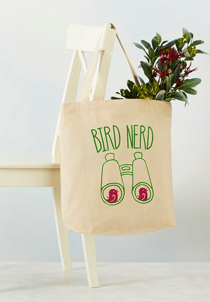 Full sized image of cotton tote bag that reads "Bird Nerd" and features an image of binoculars