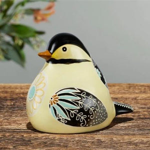 side view of Bird Song Collection Chickadee Decorative Figurine on tabletop