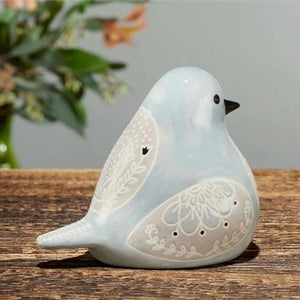 rear view of Bird Song Collection Dove Decorative Figurine on tabletop