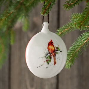 Dean Crouser Cardinal and Holly Ornament Hanging in tree